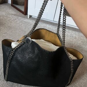 Brand new never work just been sitting in my closet it’s reversible 2 tone